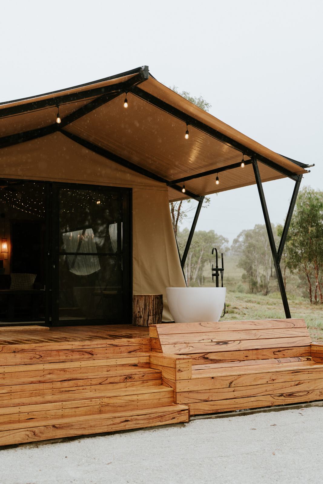 Hand-milled timber decking around the glamping tent