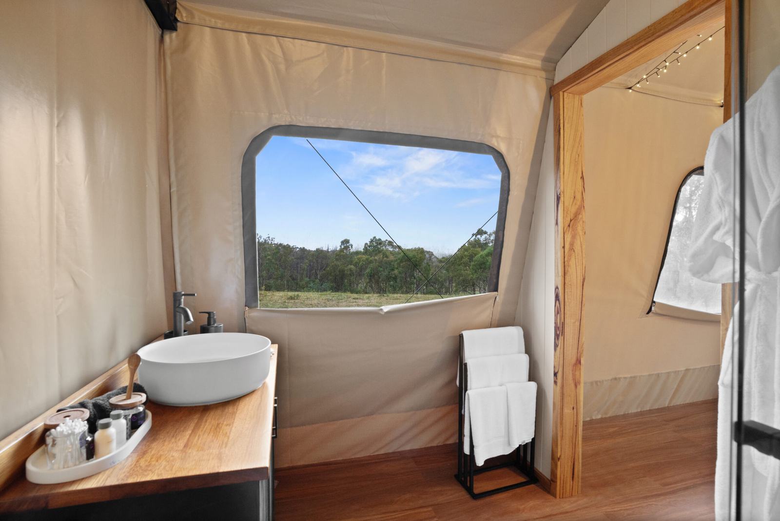 An ensuite vanity with a view to the gums