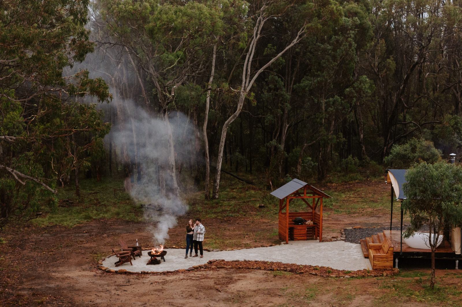 Evenings around the fire pit, smoke curling into the trees