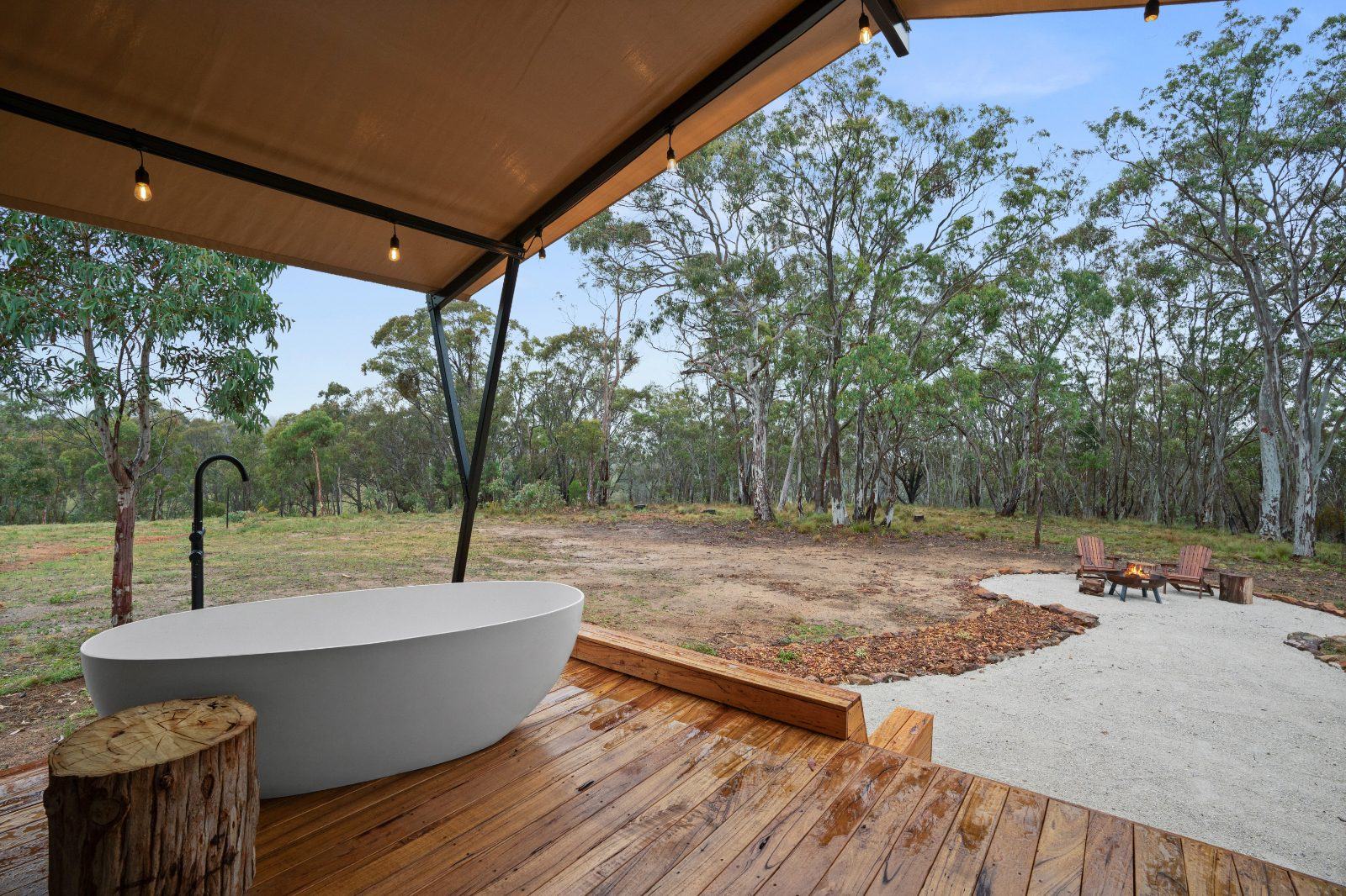 The outdoor bath on the deck, valley beyond