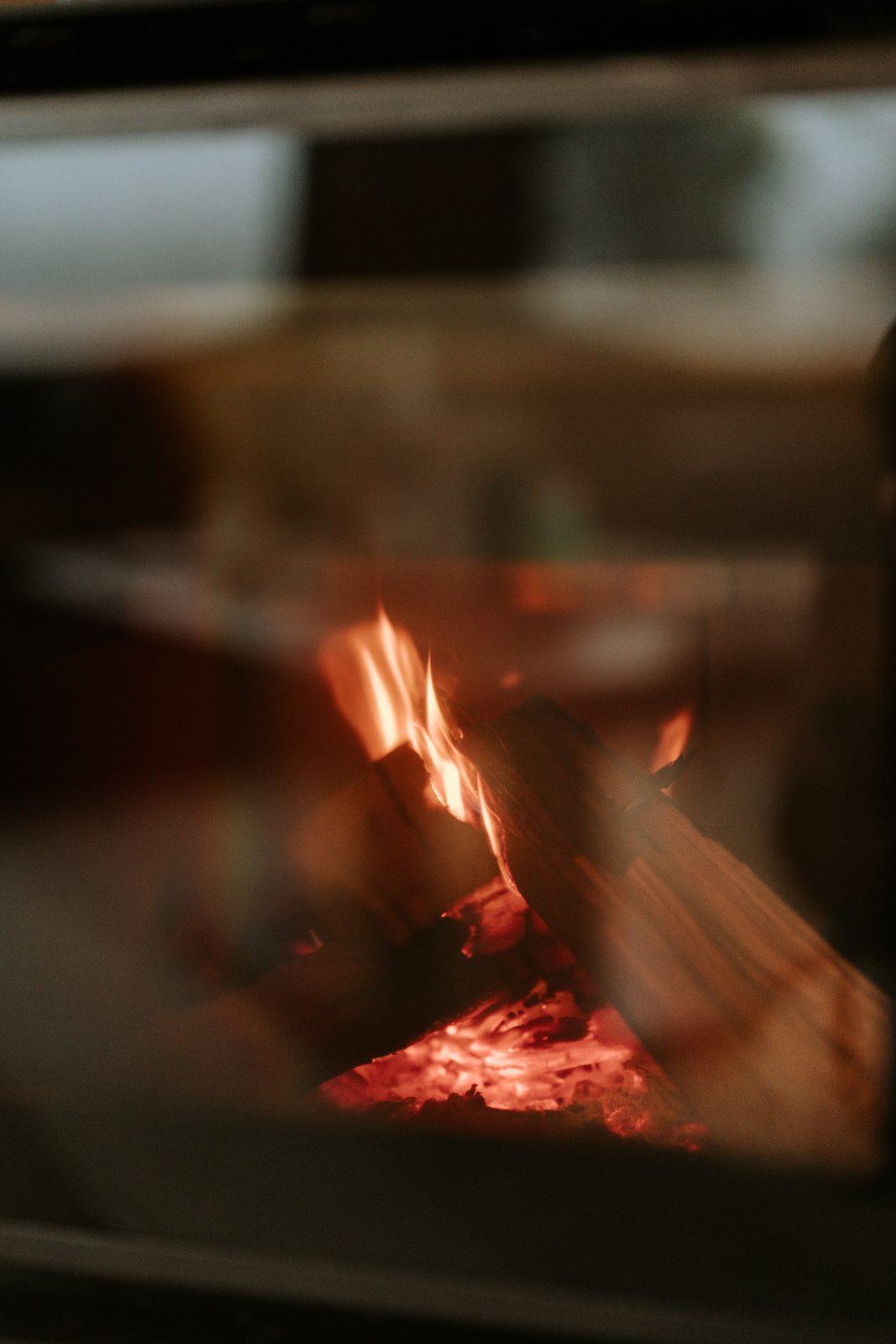Flames taking hold in the fire pit