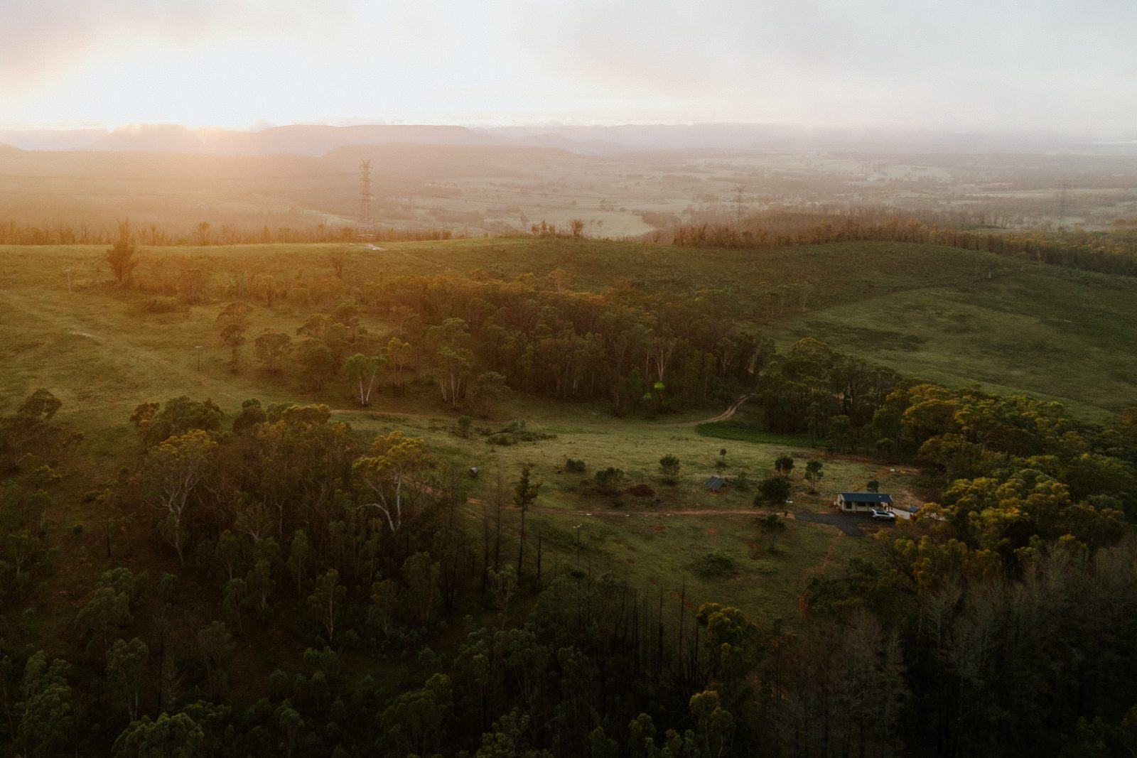 Mist lifting over the valley at first light